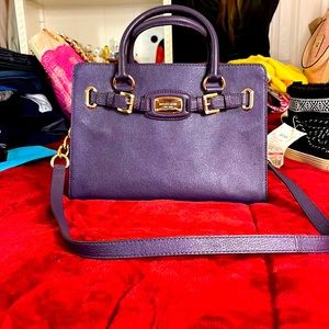 Michael Kors purple bag worn couple times. Great conditions.